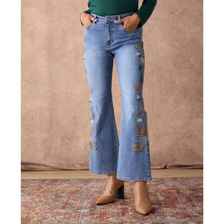 Coco + Carmen Bambu Soft Flare jeans with leaf embroidery in medium denim