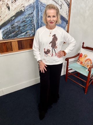 Girl Walking a Turkey Graphic Sweatshirt | Panache modeled by Vickie at Savvie’s Blue Shell Boutique