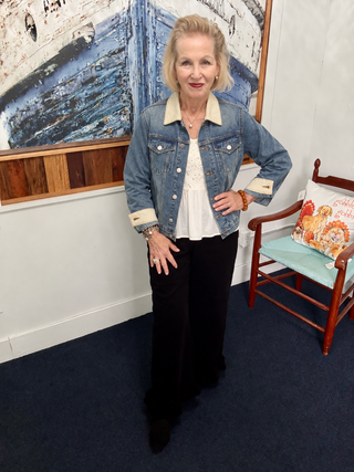 Urban Daizy Vintage Wash Denim Jacket with Elbow Patches modeled by Vickie at Savvie’s Blue Shell Boutique