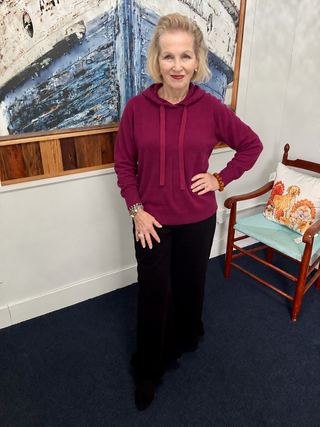 Coco + Carmen Heavenly-Luxe Lightweight Hooded Sweater modeled by Vickie at Savvie’s Blue Shell Boutique